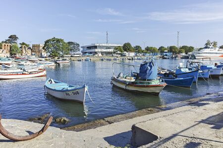 NESSEBAR, BULGARIA - AUGUST 12, 2018: Panoramic view of boat at The Port and old town of Nessebar,...