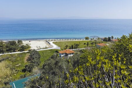 AFYTOS, KASSANDRA,  GREECE - MARCH 31, 2019: Panoramic view of beach of town of Afytos, Kassandra, Chalkidiki, Central Macedonia, Greeceのeditorial素材