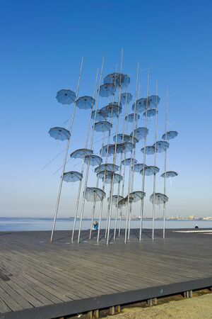 THESSALONIKI, GREECE - SEPTEMBER 22, 2019: Umbrellas sculpture at embankment of city of Thessaloniki, Central Macedonia, Greeceのeditorial素材