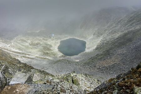 Amazing Panoramic view of hills covered with fog from Musala peak, Rila mountain, Bulgaria