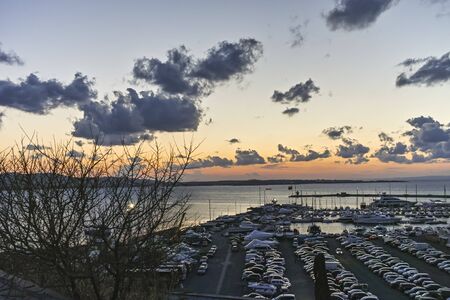 SOZOPOL, BULGARIA - AUGUST 9, 2018: Sunset view of port and Coastal street of town of Sozopol, Burgas Region, Bulgariaのeditorial素材
