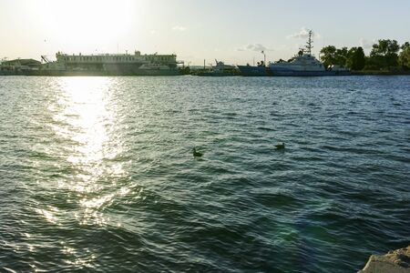SOZOPOL, BULGARIA - AUGUST 9, 2018: Sunset view of port and Coastal street of town of Sozopol, Burgas Region, Bulgariaのeditorial素材