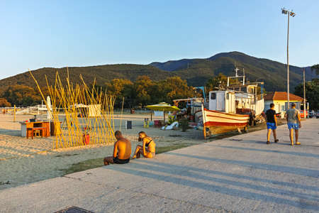 STAVROS, GREECE - AUGUST 19, 2019:  Sunset at coastline of village of Stavros, Chalkidiki, Central Macedonia, Greeceのeditorial素材