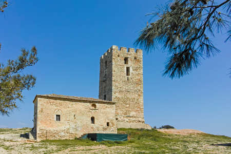 NEA FOKEA, KASSANDRA,  GREECE - MARCH 31, 2019: Byzantine Tower in town of Nea Fokea, Kassandra, Chalkidiki, Central Macedonia, Greeceのeditorial素材