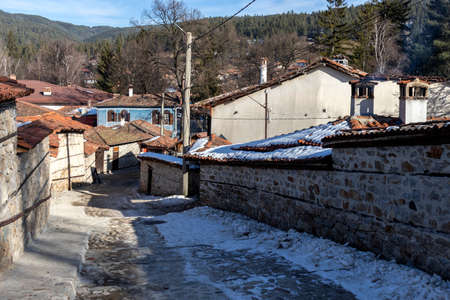 KOPRIVSHTITSA, BULGARIA - JANUARY 25, 2020: Typical Street and old houses in historical town of...