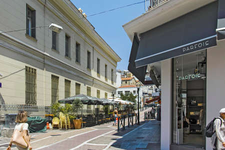 KAVALA, GREECE - JUNE 22, 2019: Typical street and houses at the center of city of Kavala, East Macedonia and Thrace, Greeceのeditorial素材