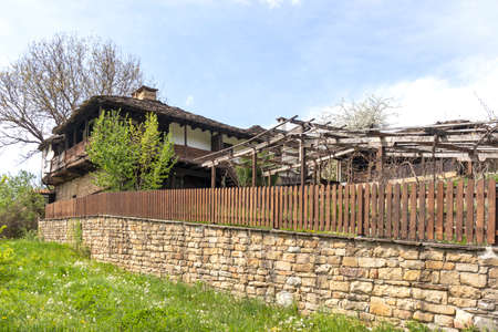 BOZHENTSI, BULGARIA - MAY 3, 2021: Typical street and old houses at historical village of Bozhentsi, Gabrovo region, Bulgariaのeditorial素材