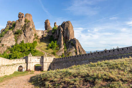 BELOGRADCHIK, BULGARIA - MAY 22, 2021: Ruins of Medieval Belogradchik Fortress known as Kaleto,...