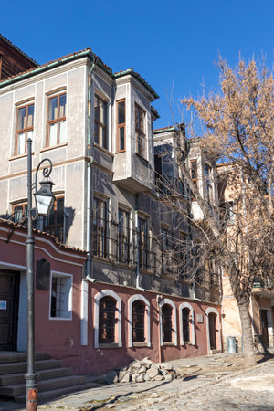 PLOVDIV, BULGARIA - JANUARY 2, 2022:  Street and Nineteenth Century Houses in architectural and historical reserve The old town in city of Plovdiv, Bulgariaのeditorial素材