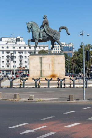 BUCHAREST, ROMANIA - AUGUST 17, 2021: Statue of Carol I in front of University Library in city of Bucharest, Romaniaのeditorial素材