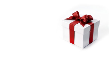 White. gift box with red satin bow isolated on background. Stylish packaging of goods, presentation. Card with place for greeting. AI generatedの素材