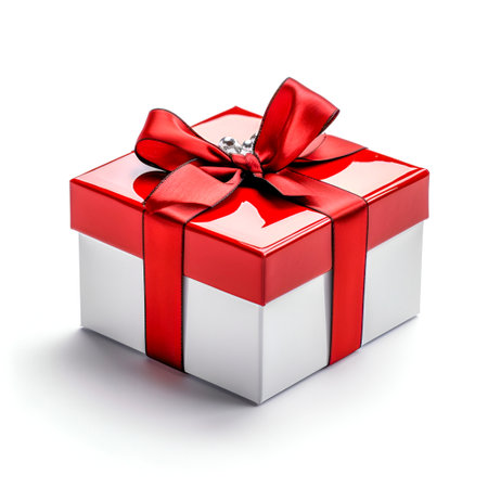 Souvenir white box tied with a scarlet ribbon on a white background. Stylish product packaging, presentation. Festive design concept. AI generatedの素材