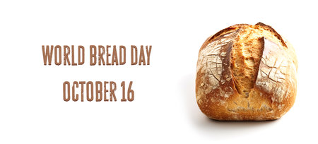 The bread is isolated on a white. Loaf of bread on a white background with text World Food Day October 16. Design for a website, calendar, banner.の素材