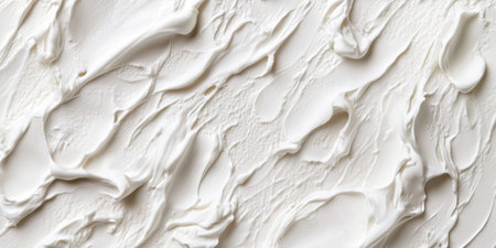 This creamy vanilla ice cream texture presents a luscious and inviting surface with soft swirls and peaks, capturing the essence of deliciousness.の素材