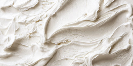 Rich, creamy vanilla ice cream showcases a smooth texture and intricate swirls, perfect for dessert presentations and culinary creativity in various recipes.の素材