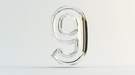 A clear and elegant representation of the number nine stands out against a plain backdrop, emphasizing its contemporary aesthetic.の素材