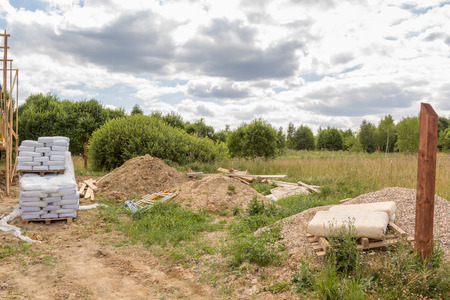 construction material and debris in a fieldの写真素材