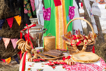 table with Russian folk desserts and samovarの写真素材