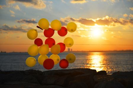 colorful balloons on beachの写真素材