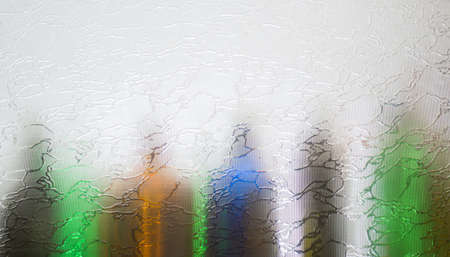 Blurred defocused bottles abstract backgroundの写真素材
