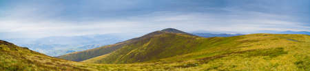 Colorful autumn mountain panorama. Wide view of Carpathians, Ukraine.の写真素材