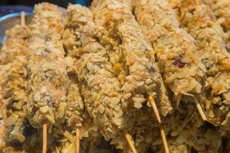 Sweets with sprinkles on stick closeup .の写真素材