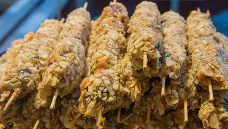 Sweets with sprinkles on stick closeup .の写真素材