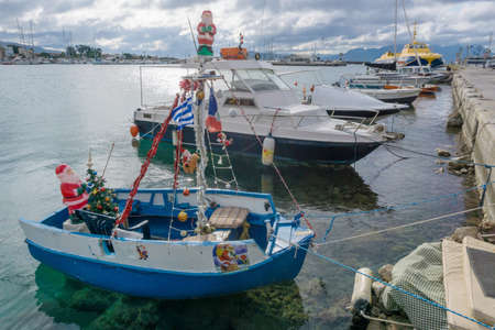 Boat decorated for Christmas in the port of Aegina, Greeceのeditorial素材