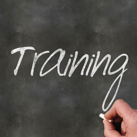 A Colourful 3d Rendered Concept Illustration showing Training written on a Blackboardの写真素材