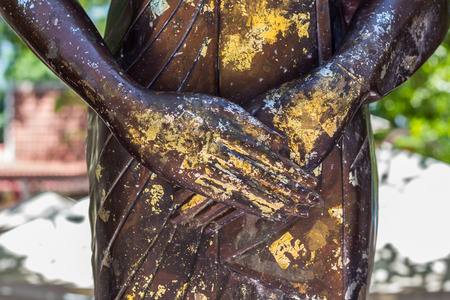 Hand of Buddha statue, Thailand.の写真素材