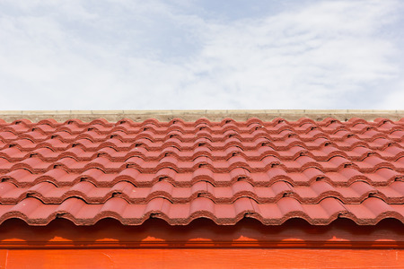 New roof tiles with sky background.の写真素材