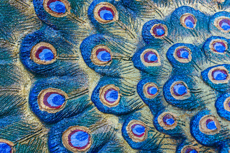 Close up feather peacock statue for use background.の写真素材