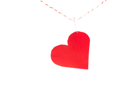 red paper heart on rope.の写真素材
