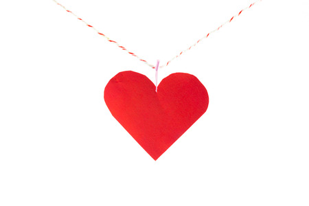 red paper heart on rope.