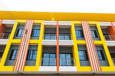A new apartment building in city on white background.