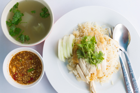 Steam Chicken with Rice (Hainan Chicken) serve with soup.の写真素材