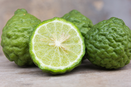 kaffir lime fruits on wood background.の写真素材