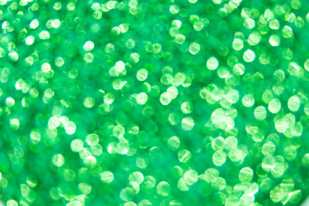abstract background green bokeh circles for use backgroundの写真素材