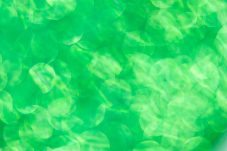 abstract background green bokeh circles for use backgroundの写真素材