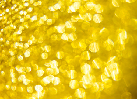 abstract background gold bokeh circles for use backgroundの写真素材