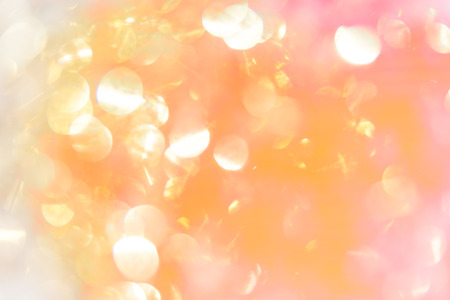 abstract background gold bokeh circles for use background.の写真素材