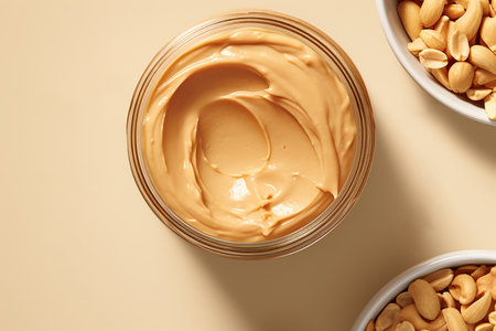 Generative AI Image of Peanut Butter in Jar with Cashew Nut in Bowlの素材