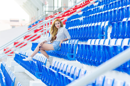 Fashion stylish woman on the grandstand