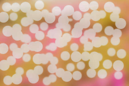 Abstract bright blur pink white and yellow bokeh background.の写真素材