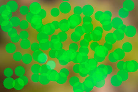 Abstract bright blur green and yellow bokeh background.の写真素材