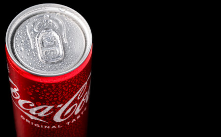 Ukraine, Kamenets -Podolsky - 04 January 2022: Coca Cola bottle with splashes of water on a black backgroundのeditorial素材