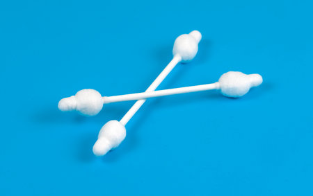 ear sticks on blue background