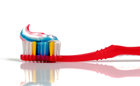 Toothpaste and toothbrush on a white background .の写真素材