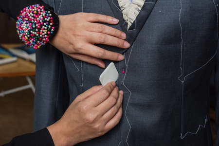Close-up of tailor at workの写真素材