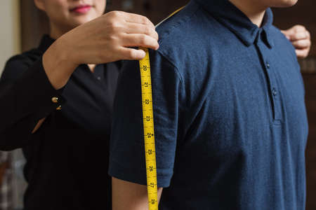 Close-up of tailor at work,の写真素材